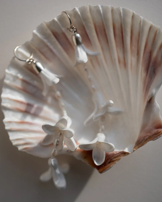 Close-up of handmade foam hyacinth petals and vintage pearls.