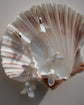Close-up of handmade foam hyacinth petals and vintage pearls.