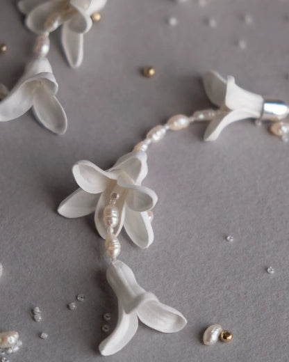 11cm long floral wedding earrings on a neutral background.