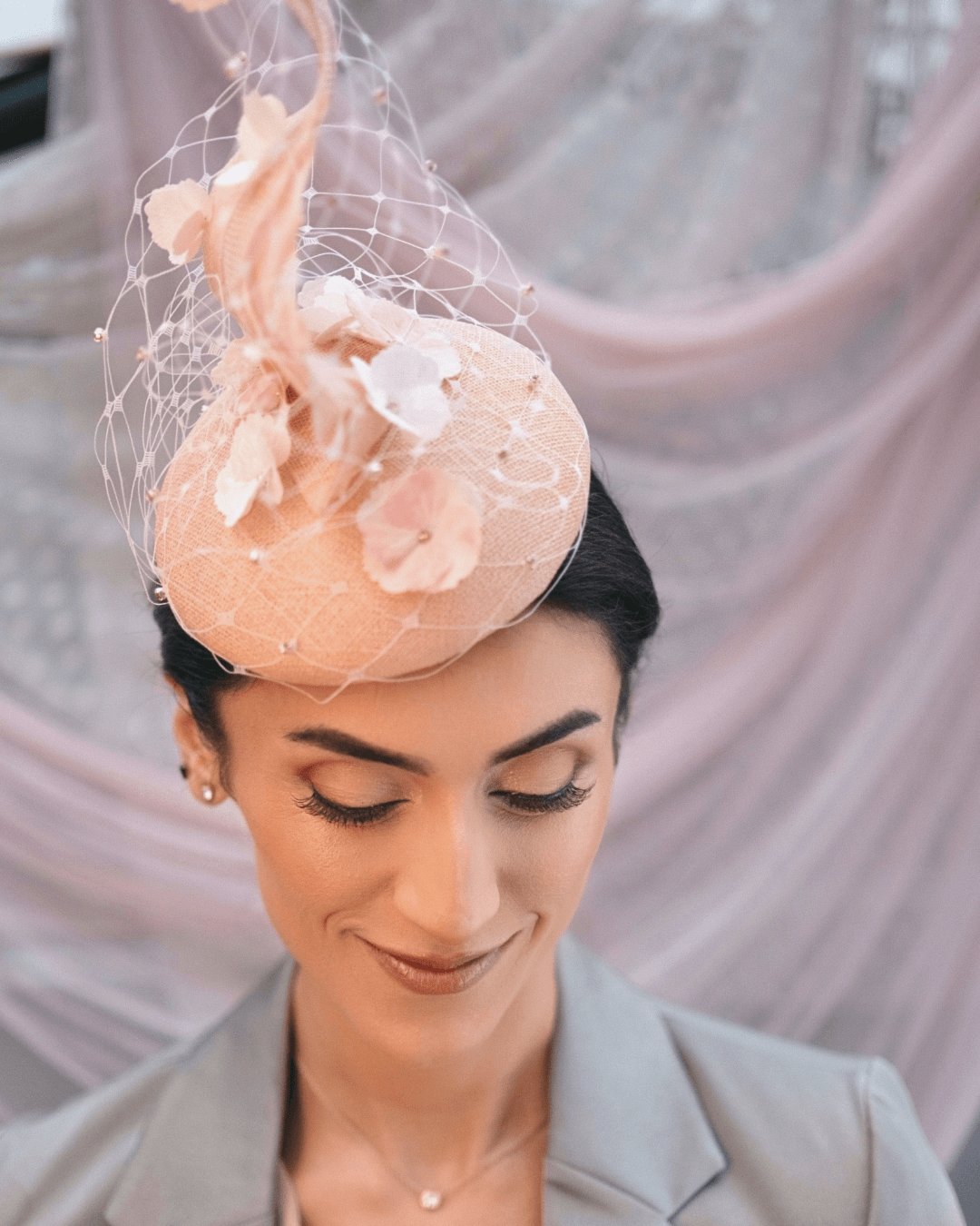 sculptural floral fascinator with veil
