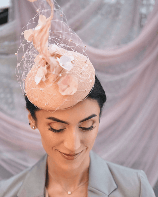 sculptural floral fascinator with veil