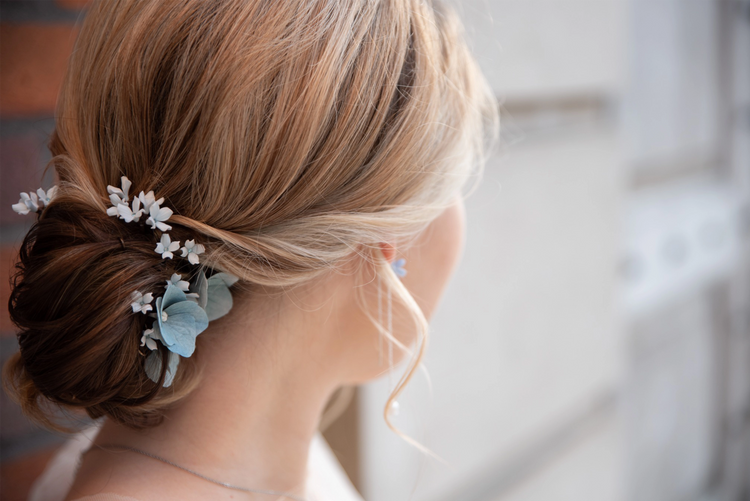 Delicate cherry blossom hairpins – handmade floral accessories for an ethereal bridal look.