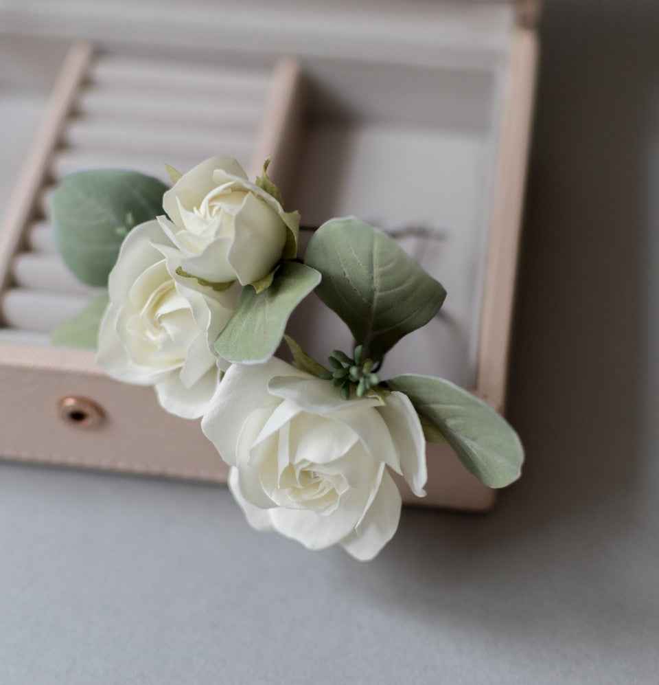 Ivory roses and eucalypt leaves