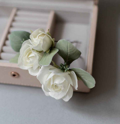 Ivory roses and eucalypt leaves