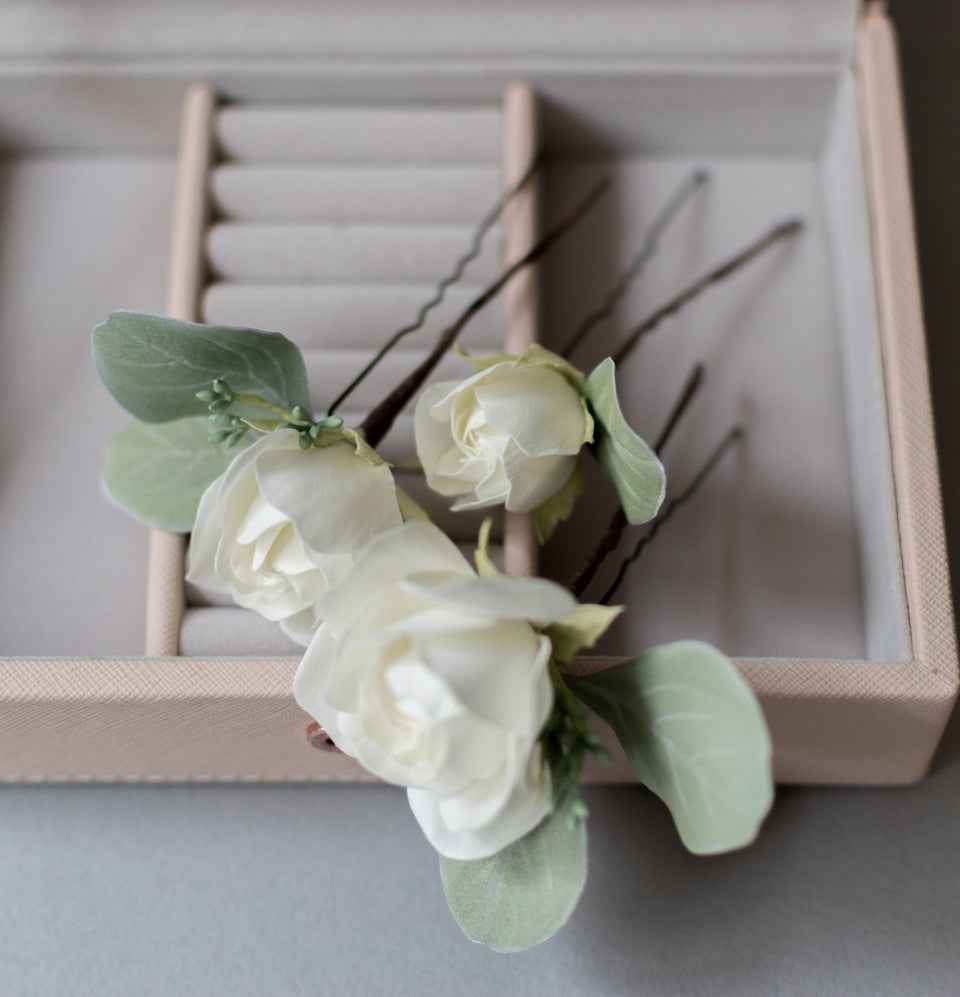 Ivory roses and eucalypt leaves